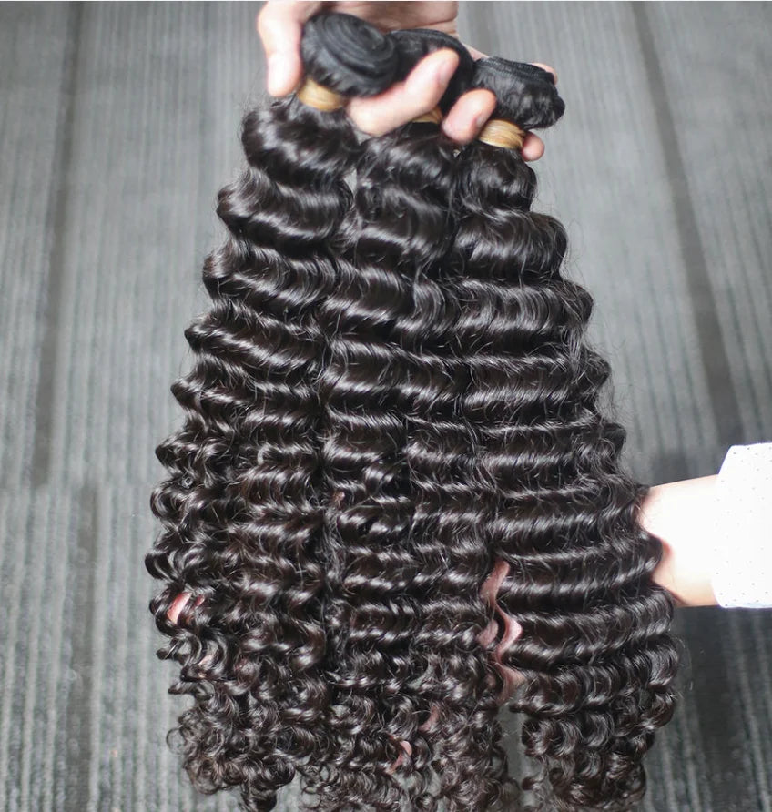 Aurasilk deep wave bundle extensions in Brazilian Remy human hair with machine double weft and a natural color