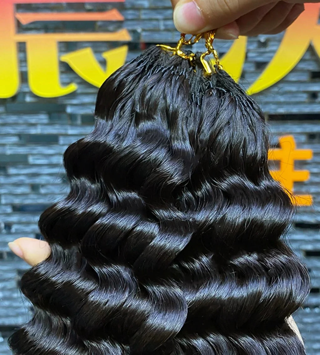 Aurasilk deep wave bundle extensions in Brazilian Remy human hair with machine double weft and a natural color
